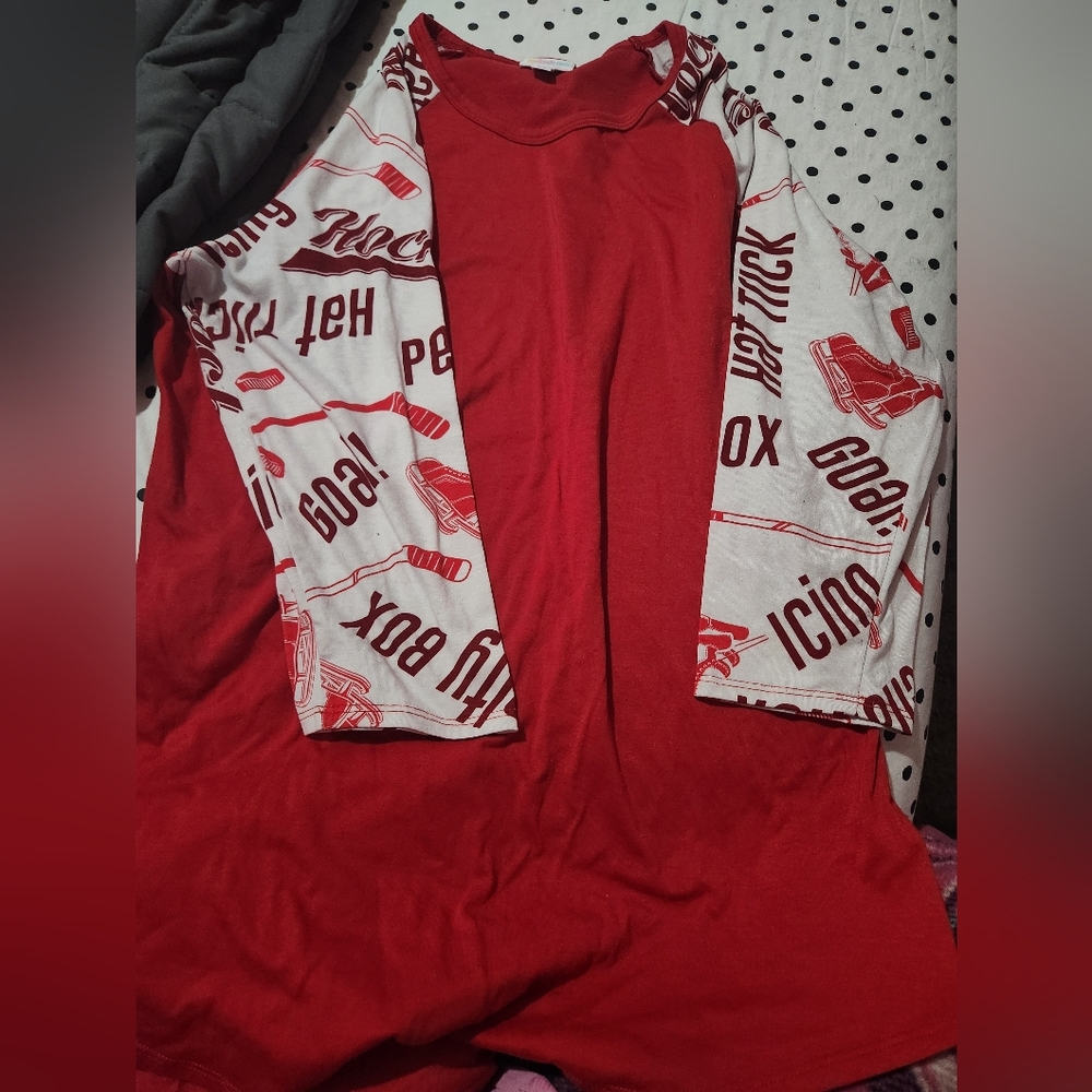 LulaRoe 3/4 sleeve hockey theme top